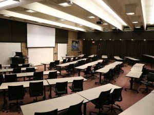 Classroom (Todd Wehr 104) with desks, chairs and whiteboard