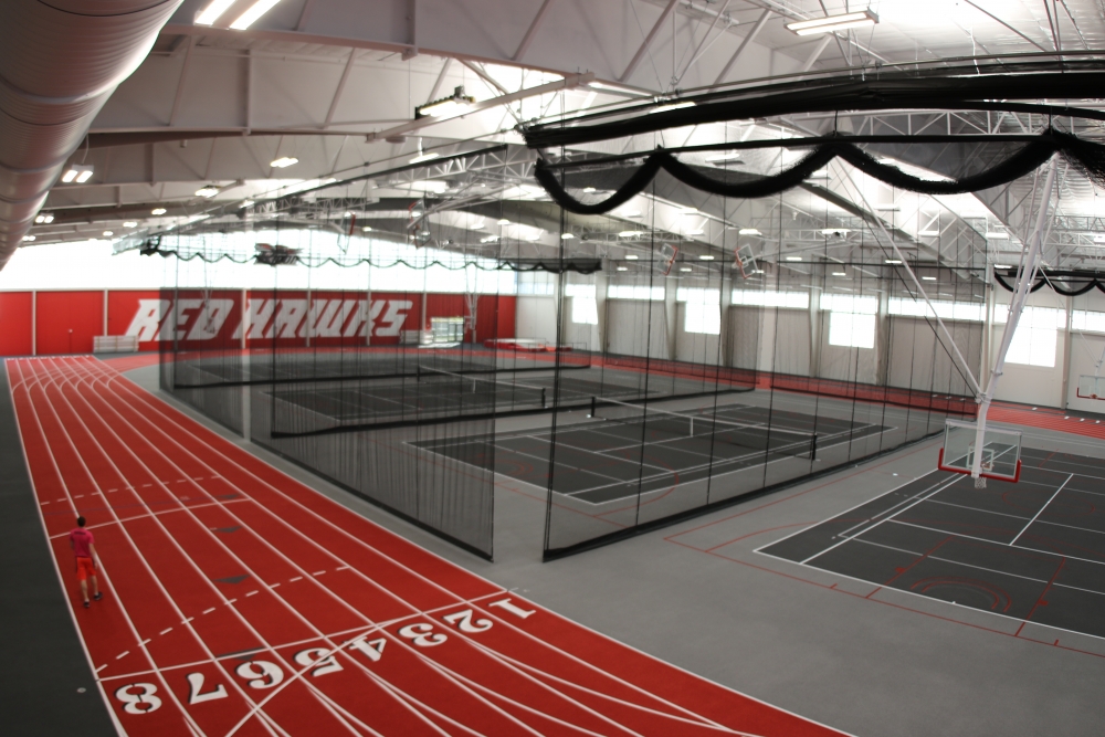 Large, versatile court with a track around the outskirts
